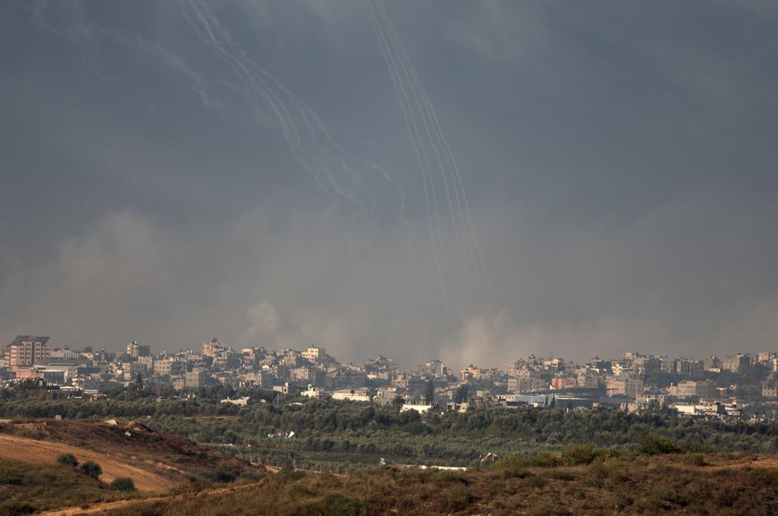 Streaks and smoke are seen across the sky following Israeli air strikes on Jabalia refugee camp, in the northern Gaza Strip, as seen from the Israeli side of the border, near the city of Sderot, southern Israel, Nov. 17, 2023. (EPA Photo)