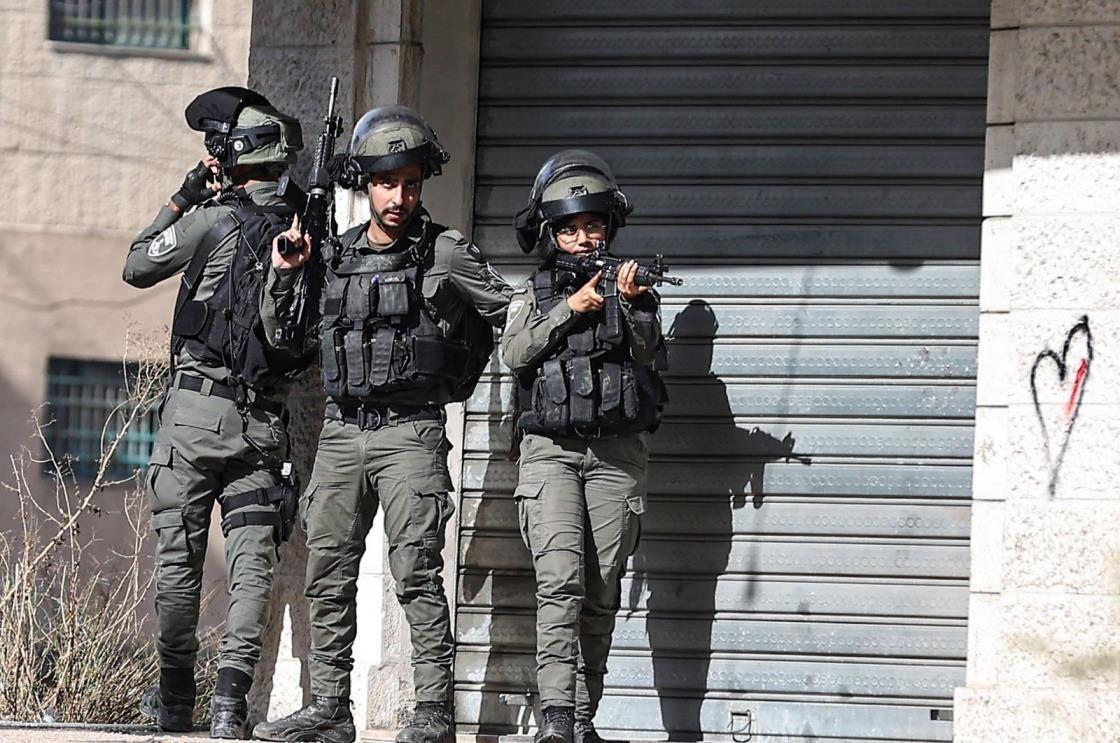Members of the Israeli border police take positions during a raid at the Balata camp for Palestinian refugees, east of Nablus, West Bank, Palestine, Nov. 23, 2023. (AFP Photo)